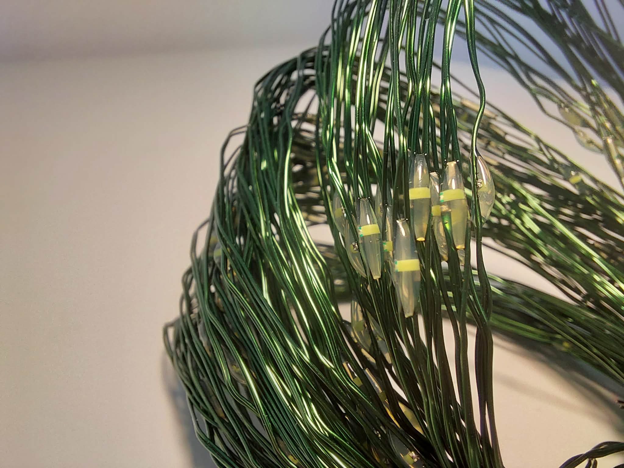Zväzok 10 svietiacich reťazcov po 25 micro LED studená biela s časovačom, 2,4m