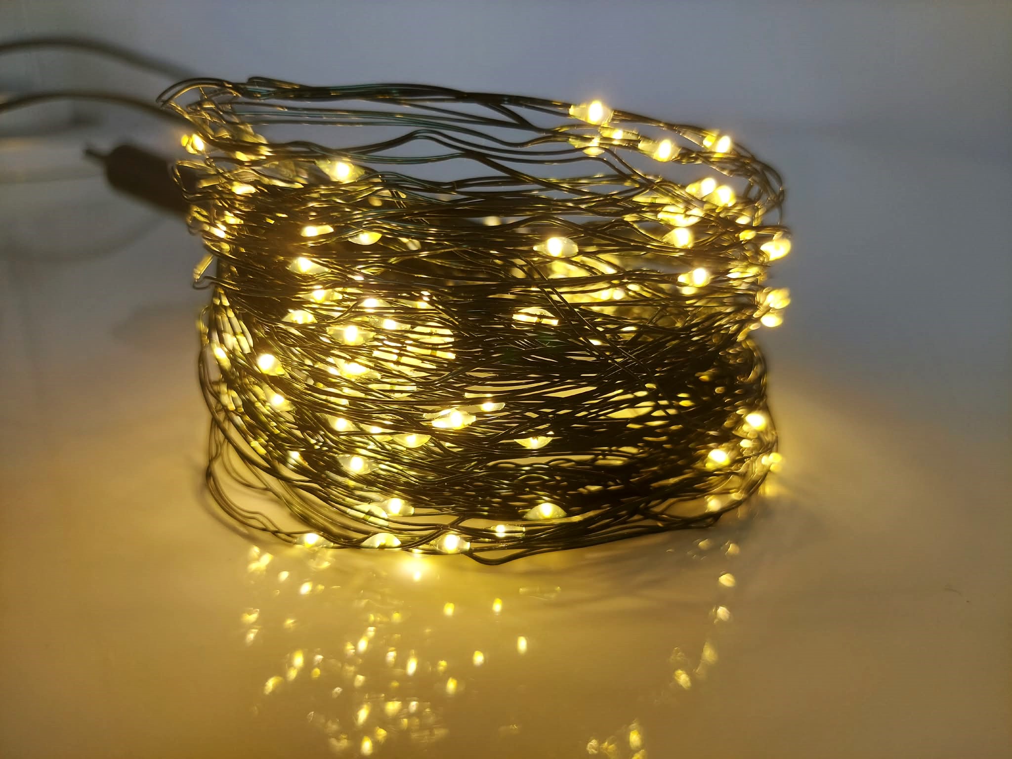 Zväzok 10 svietiacich reťazcov po 25 micro LED teplá biela s časovačom, 2,4m