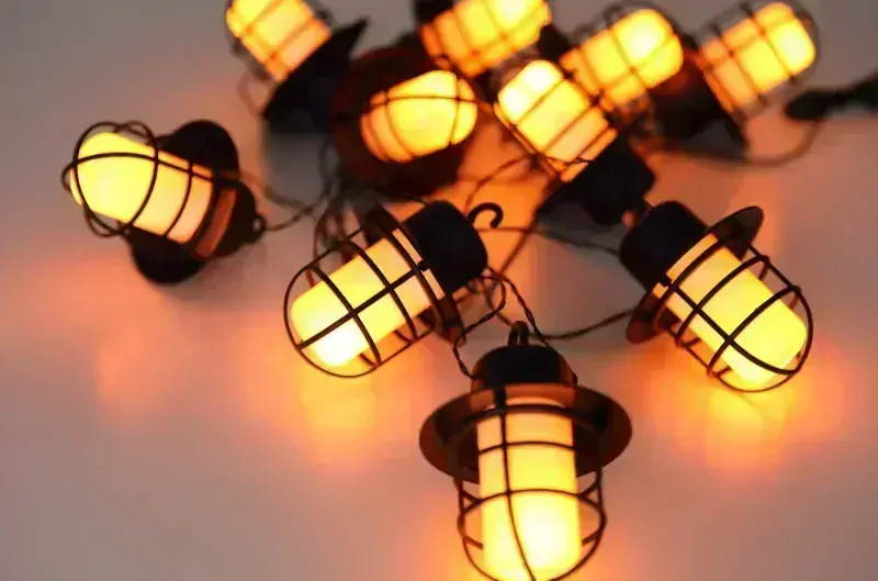 Solárna reťaz s lampášikmi 100xLED oranžová s efektom ohňa/0,1W/3V/1700K IP44, 3,15m