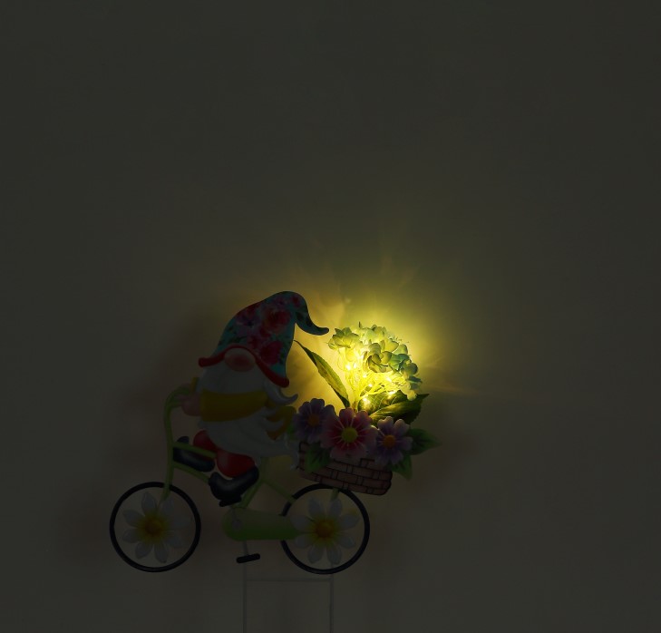 Solárne zapichávacie led svietidlo trpaslík na bicykli s kvetmi 20xLED,0,06W,3V 3000K, výška: 44cm